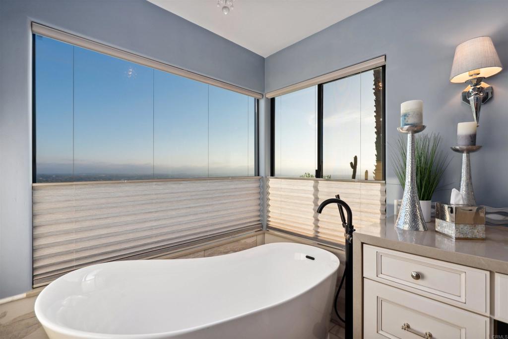 1966 Las Lomas Vista, CA 92084 - Photo 31 of 48 a bathroom with a bathtub and a sink