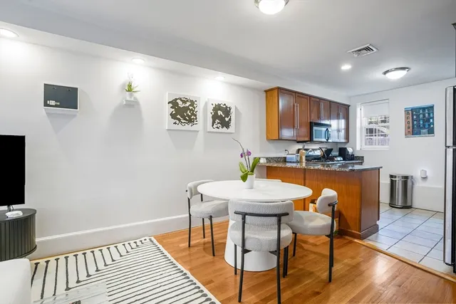 a view of a dining room with furniture