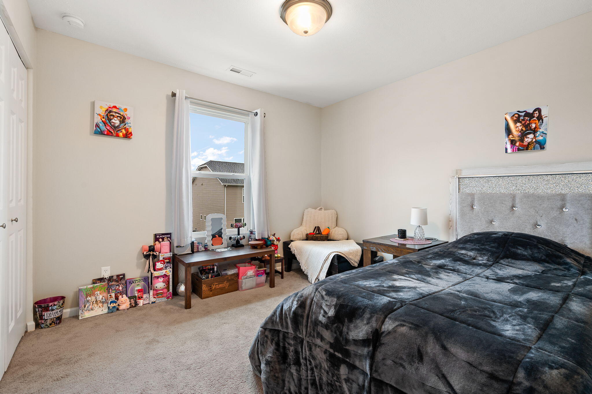 2434 Jupiter Street Portage, IN 46368 - Photo 23 of 30 a bedroom with bed and a window