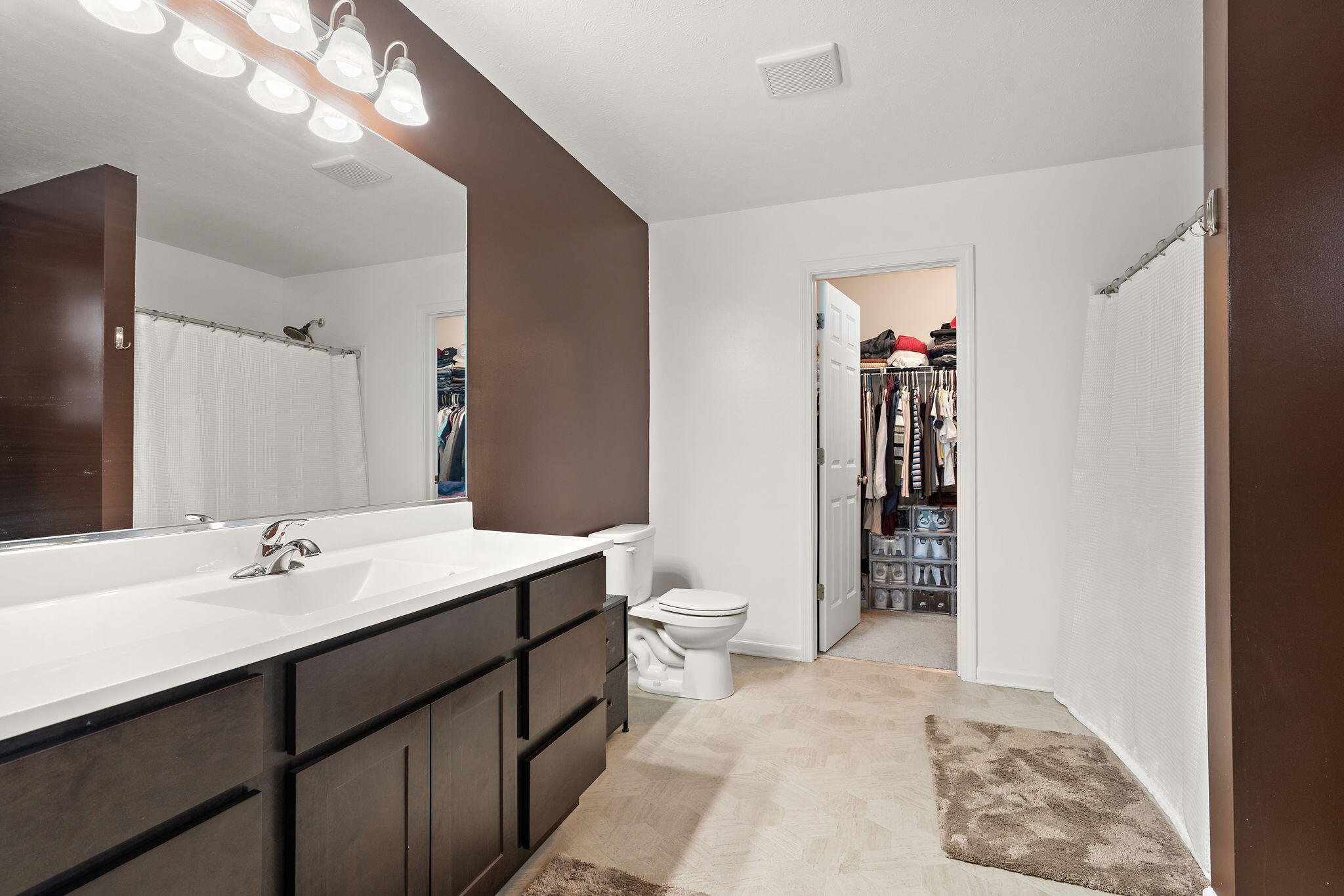 2434 Jupiter Street Portage, IN 46368 - Photo 27 of 30 a spacious bathroom with a sink toilet and shower