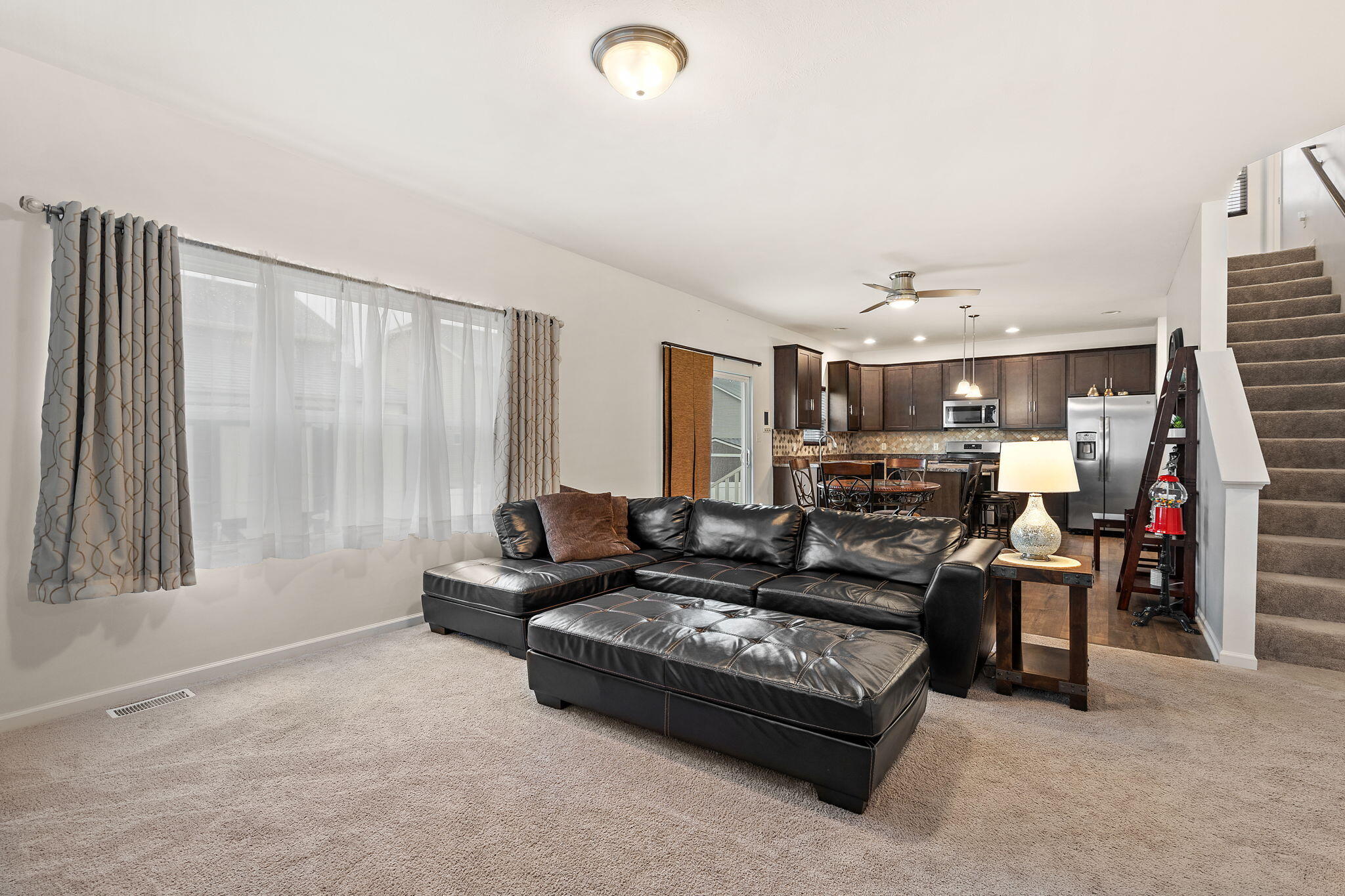 2434 Jupiter Street Portage, IN 46368 - Photo 10 of 30 a living room with furniture and a flat screen tv