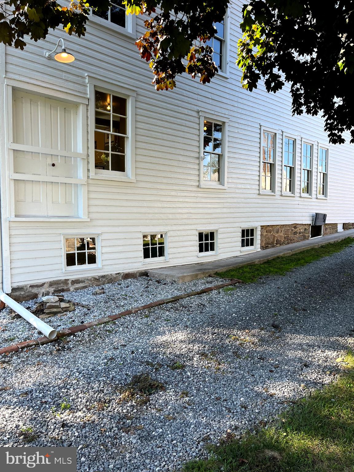 3459 Uniontown Road Westminster, MD 21158 - Photo 22 of 29 a view of a house with a yard and sitting area