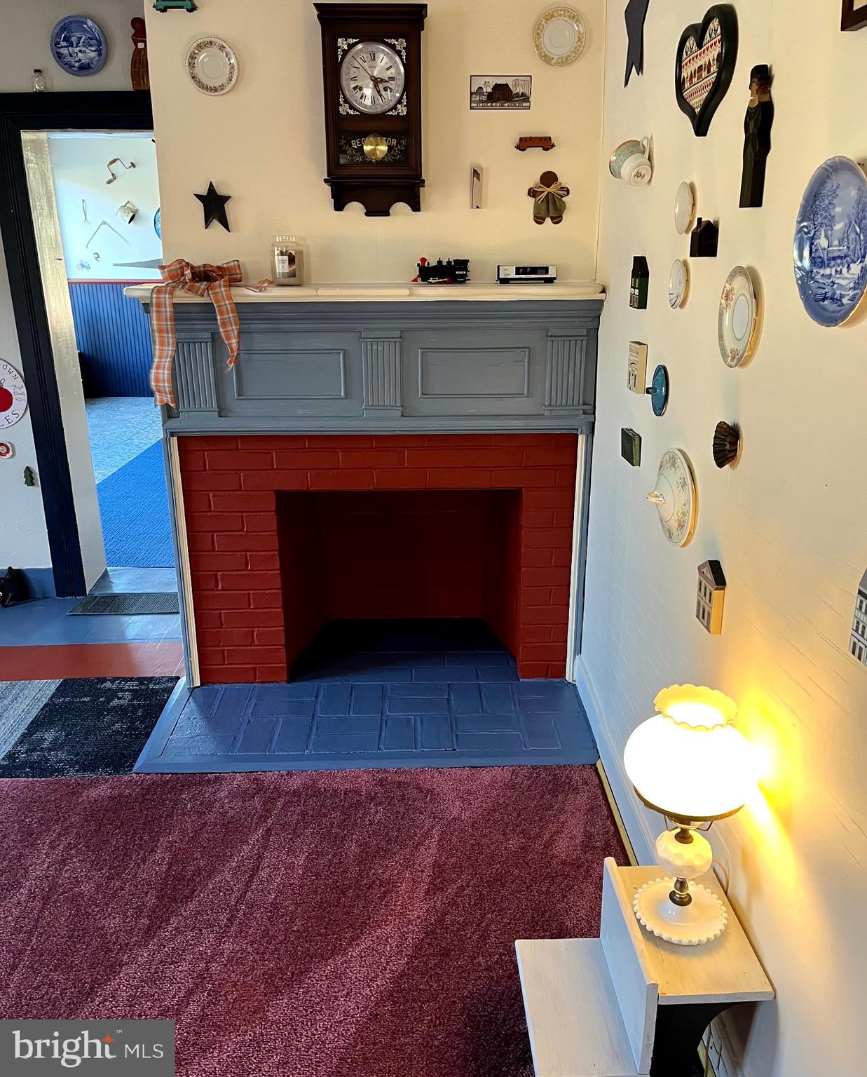 3459 Uniontown Road Westminster, MD 21158 - Photo 10 of 29 a living room with furniture and a fireplace