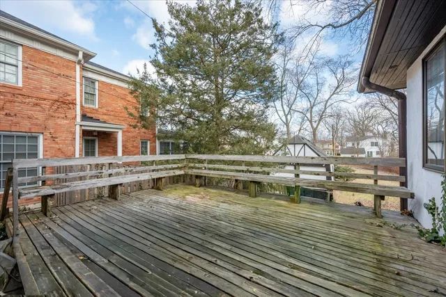 a view of balcony with wooden floor and outdoor space