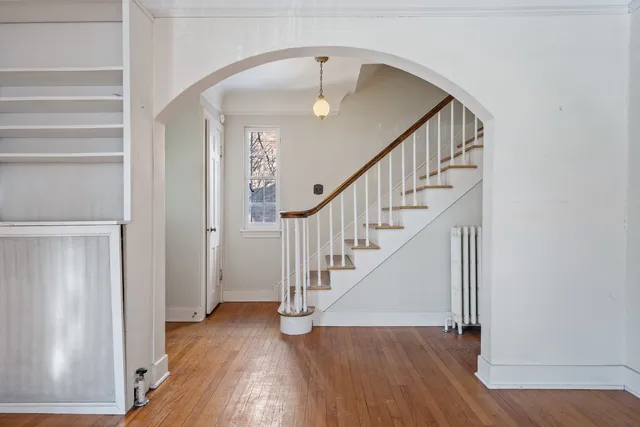 a view of staircase with wooden floor and staircase
