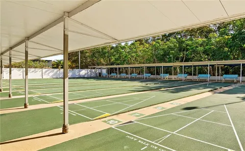 a view of a tennis court with a tennis court