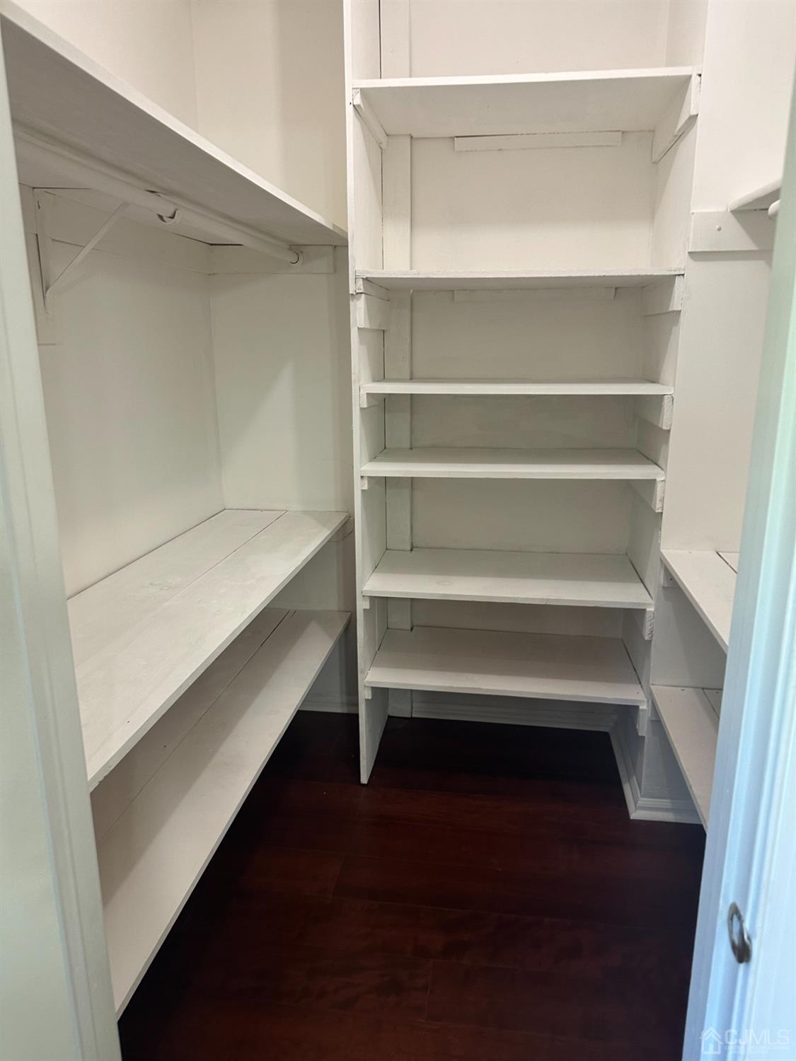 62 Goodwin Drive North Brunswick, NJ 08902 - Photo 17 of 23 a storage room with wooden floor