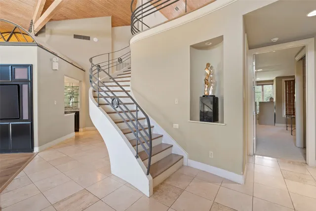 a view of entryway and hall with a hallway