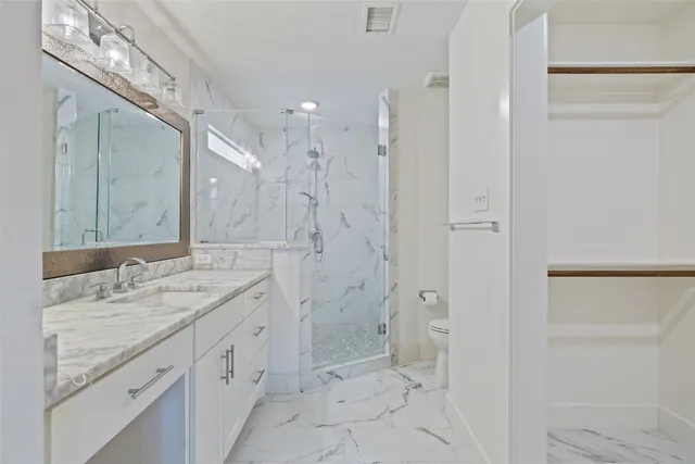 a view of a room with wooden floor and closet