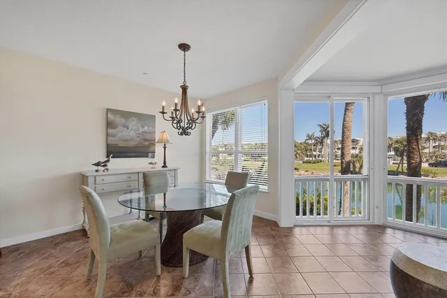 a view of a livingroom with furniture and a ceiling fan