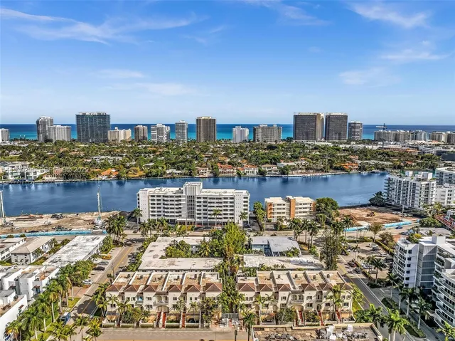 a view of a terrace with wooden floor and city view