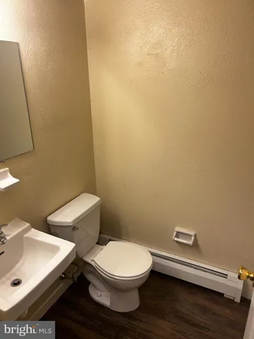 a bathroom with a sink and a toilet