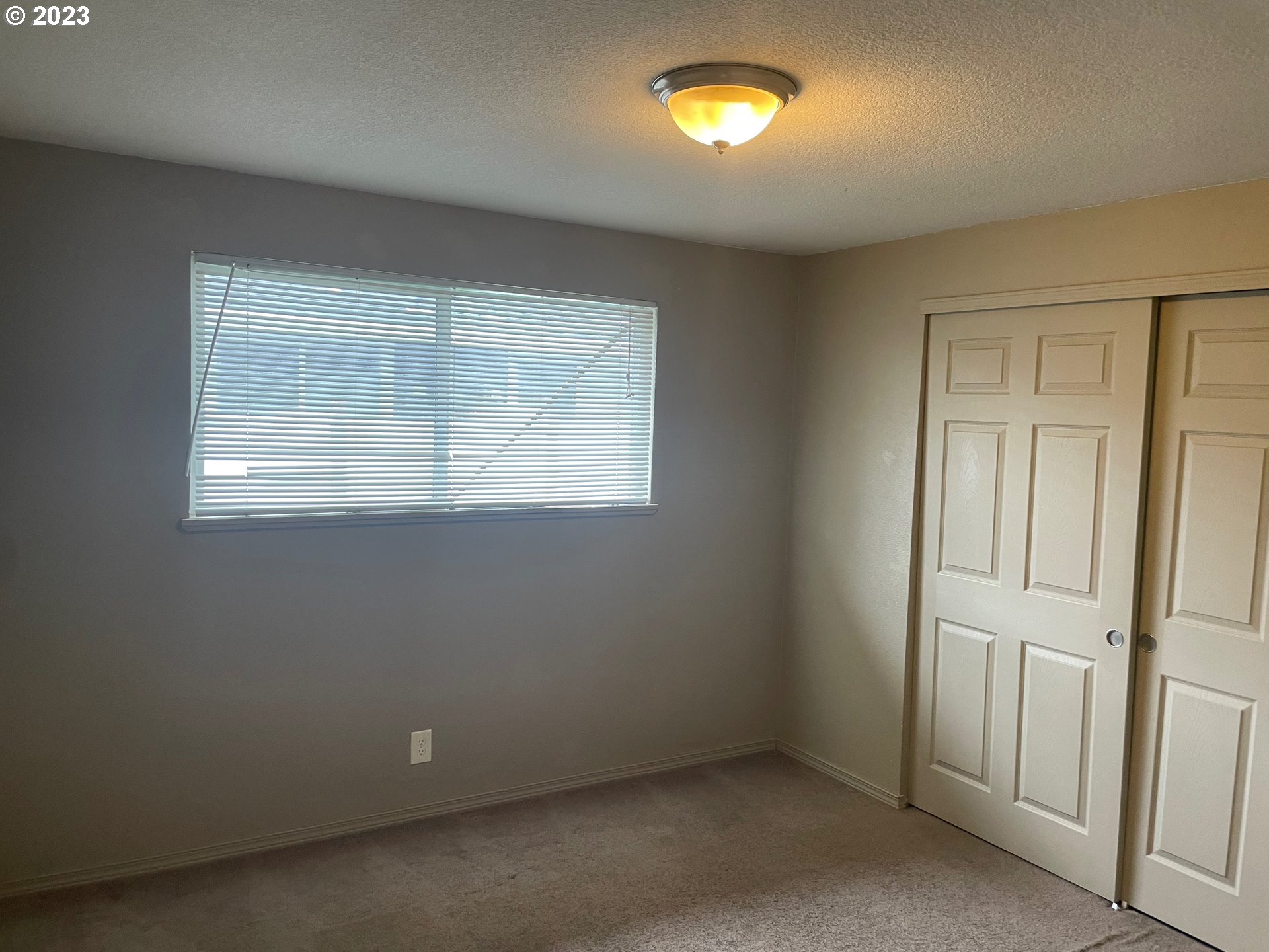 3205 W Street Vancouver, WA 98663 - Photo 5 of 6 an empty room with windows