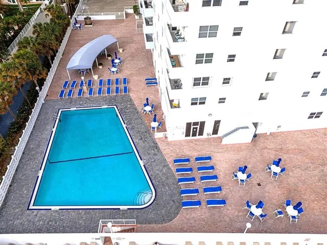 a view of swimming pool with a living room