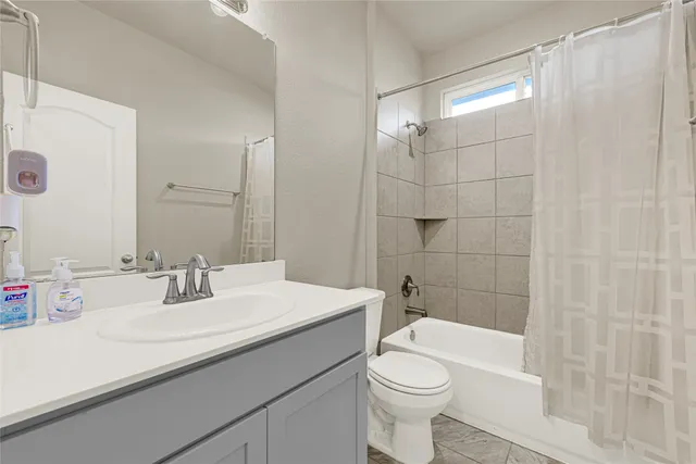 a children room with toys and a couch