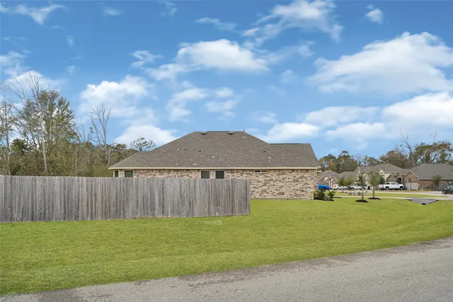 a view of a yard with an outdoor space
