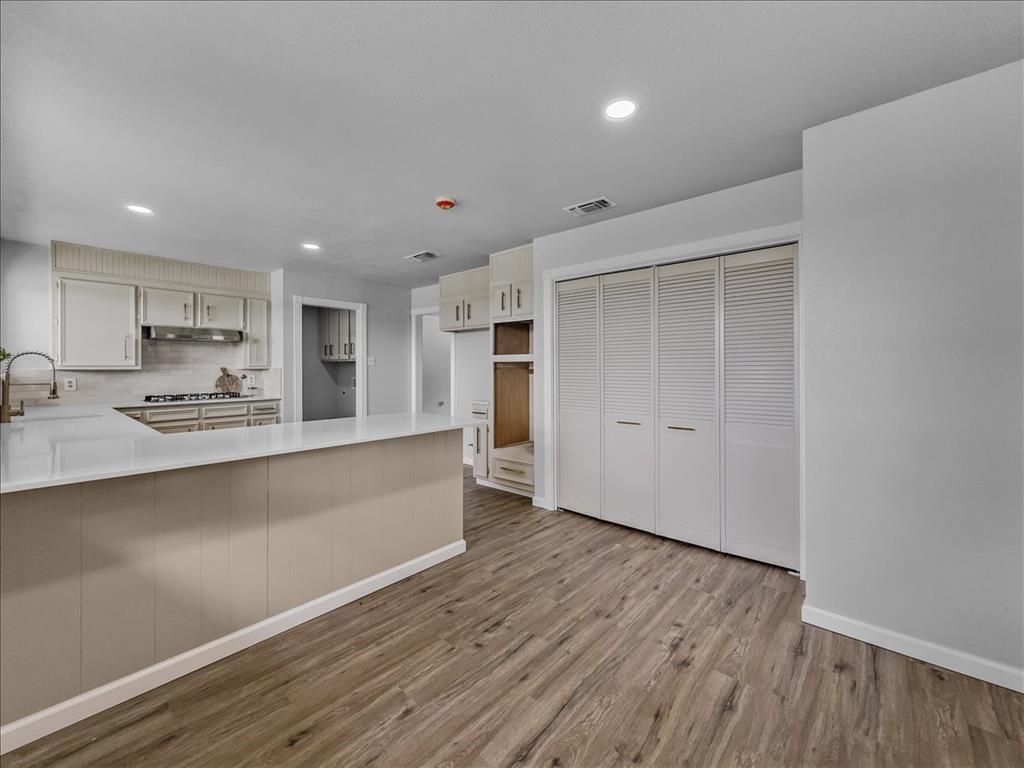 136 Southwest Rand Drive Burleson, TX 76028 - Photo 5 of 25 a view of kitchen with wooden floor