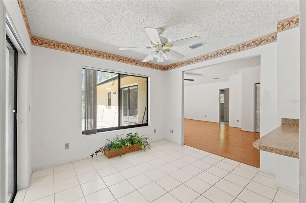 1379 Matthew Avenue Spring Hill, FL 34609 - Photo 17 of 55 a view of an entryway with a chandelier fan