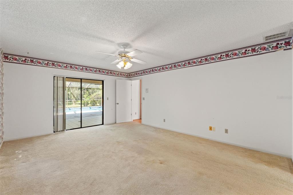 1379 Matthew Avenue Spring Hill, FL 34609 - Photo 26 of 55 a view of an empty room with a window