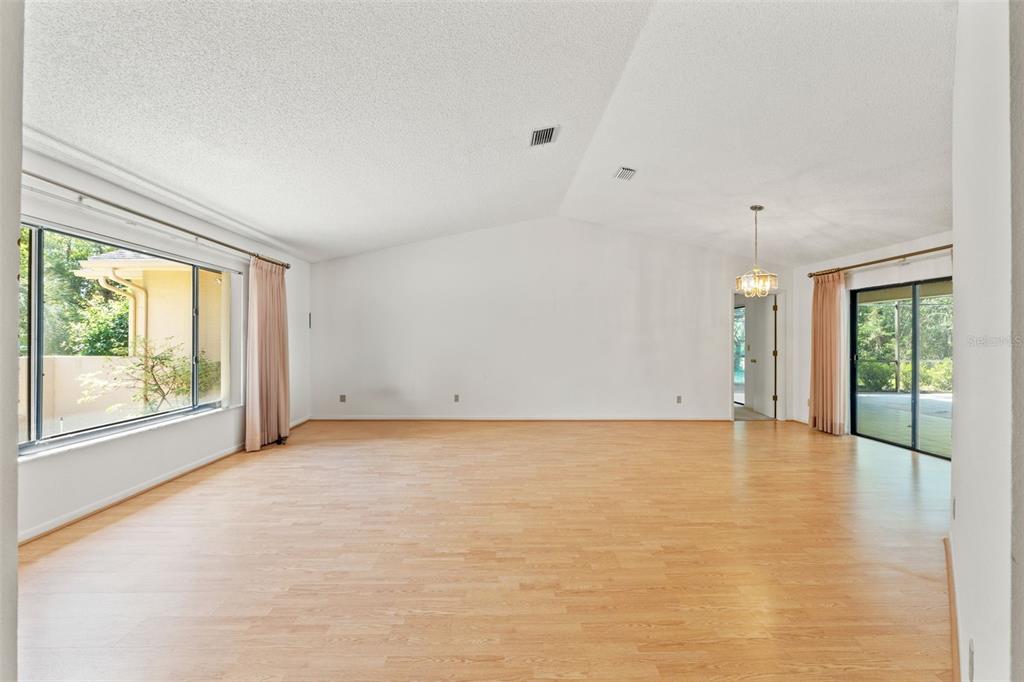 1379 Matthew Avenue Spring Hill, FL 34609 - Photo 9 of 55 a view of an empty room with a window