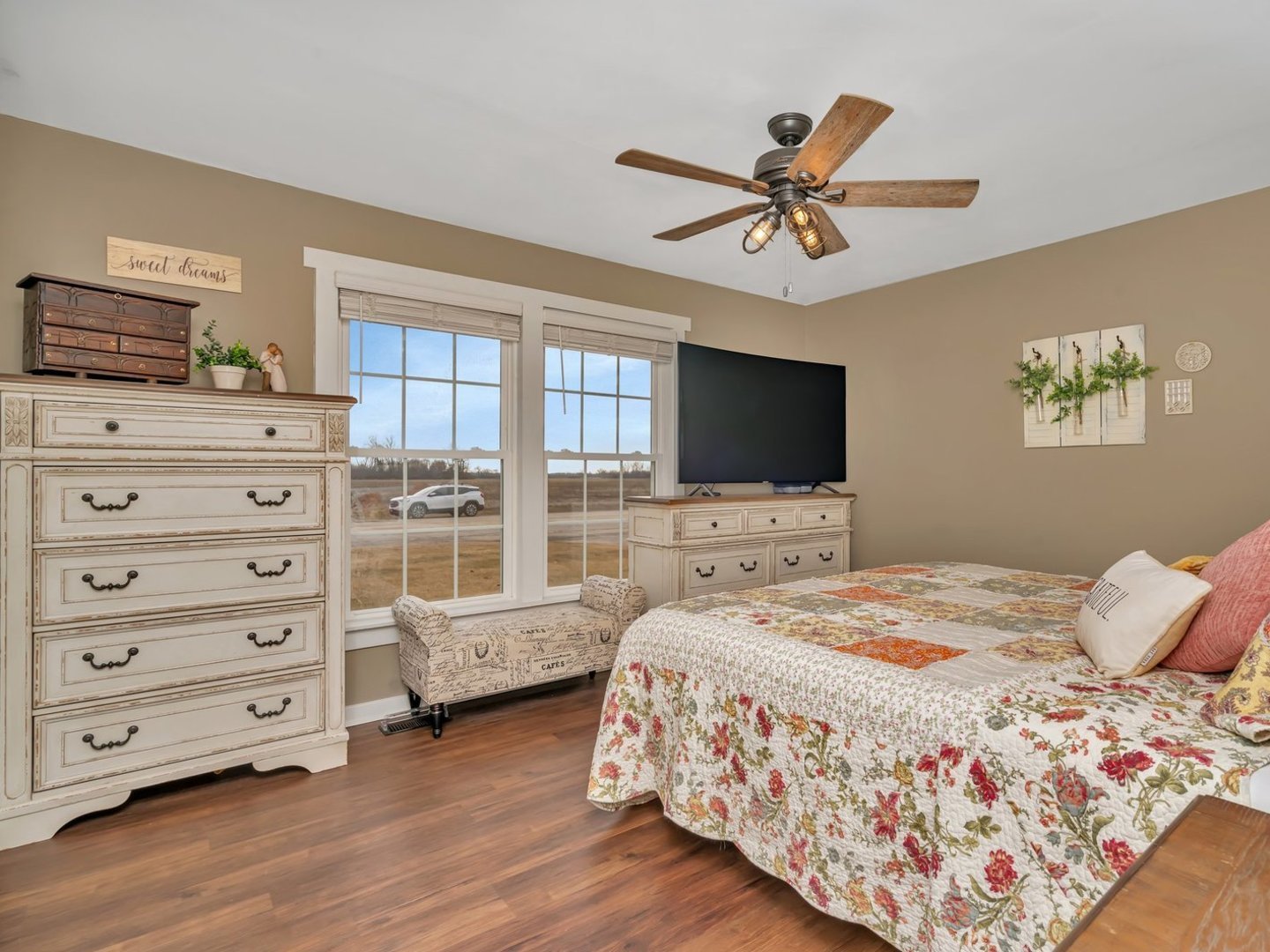 1070 West Kennedy Road Braidwood, IL 60408 - Photo 13 of 33 a bedroom with a bed a window and a flat screen television