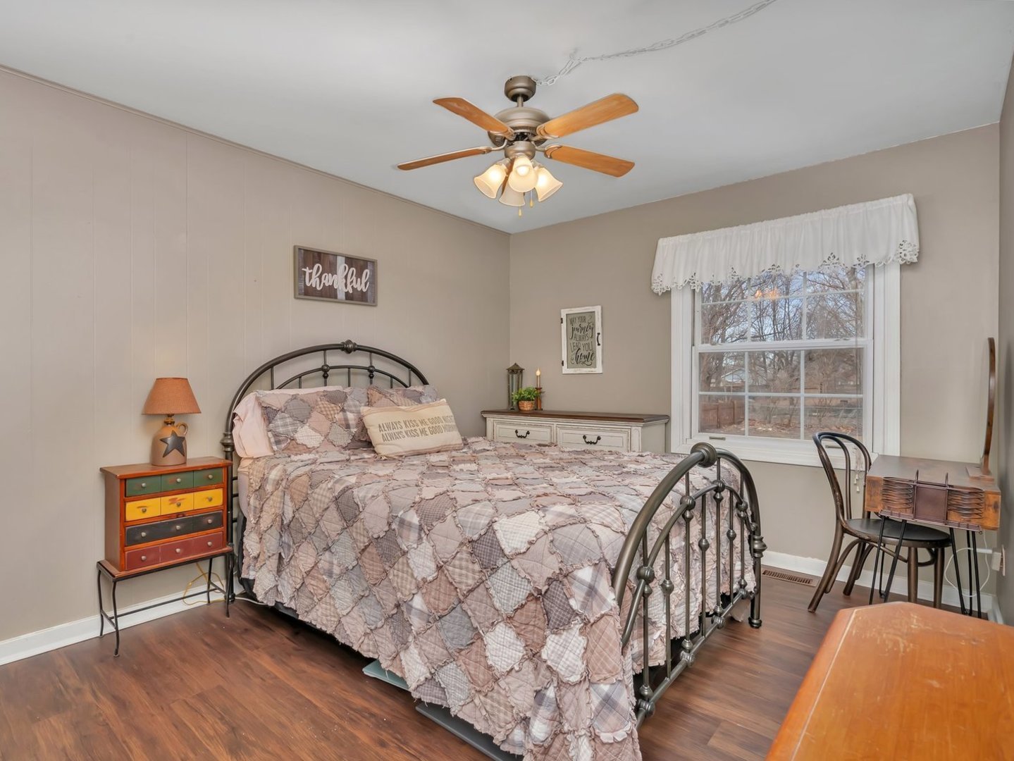 1070 West Kennedy Road Braidwood, IL 60408 - Photo 15 of 33 a bedroom with bed and a large window