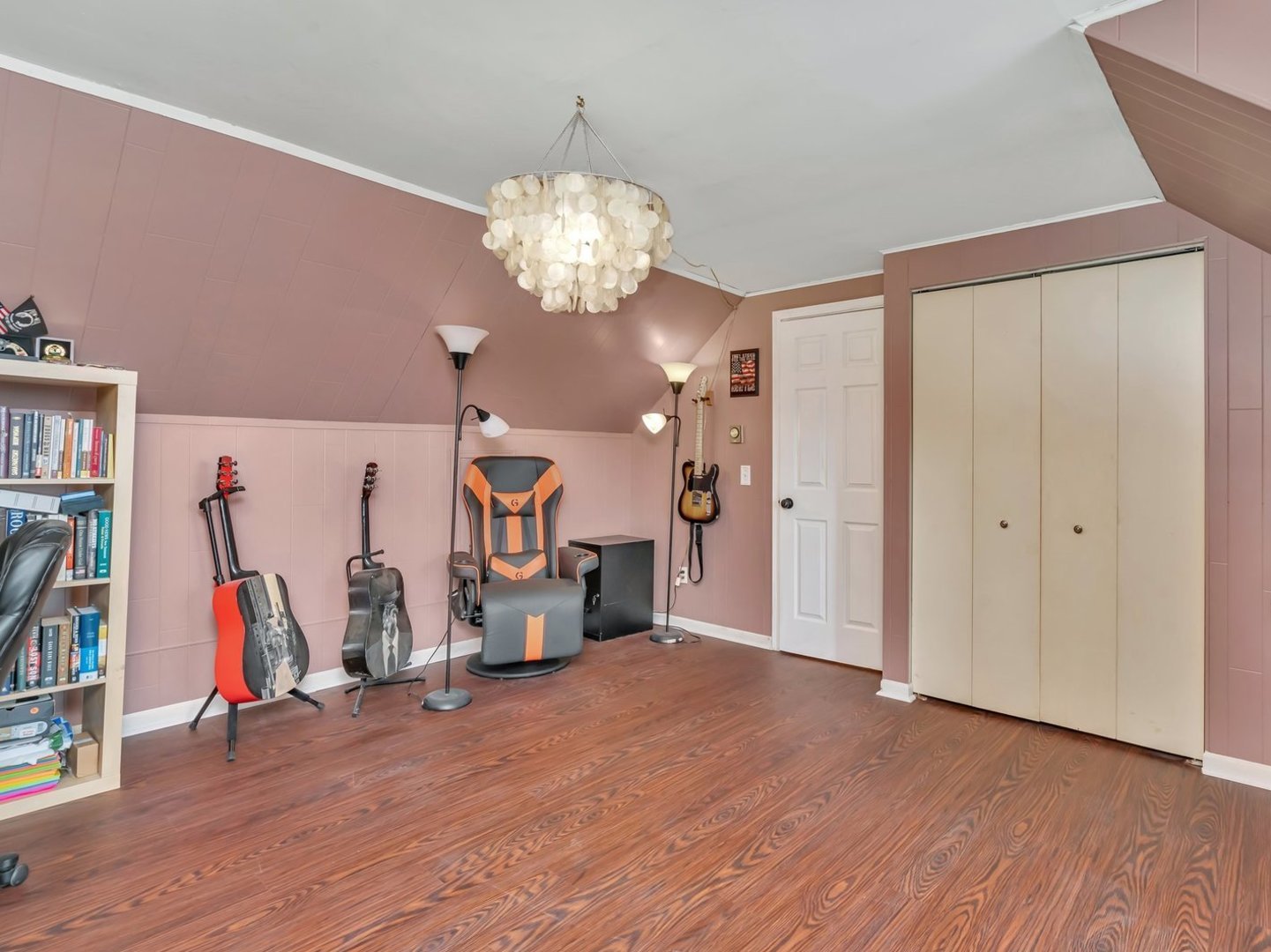 1070 West Kennedy Road Braidwood, IL 60408 - Photo 17 of 33 a view of a room with gym equipment and a chandelier