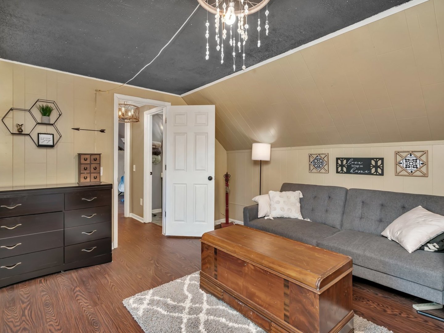 1070 West Kennedy Road Braidwood, IL 60408 - Photo 21 of 33 a living room with furniture and a chandelier