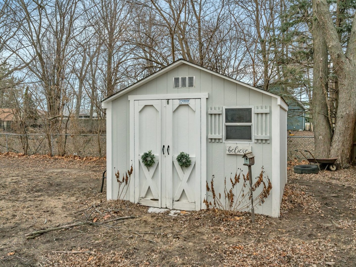 1070 West Kennedy Road Braidwood, IL 60408 - Photo 26 of 33 a view of a wooden house with large trees