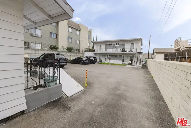 a view of a livingroom with furniture and a garage