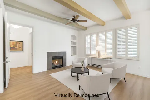 a kitchen with stainless steel appliances kitchen island granite countertop a refrigerator and microwave