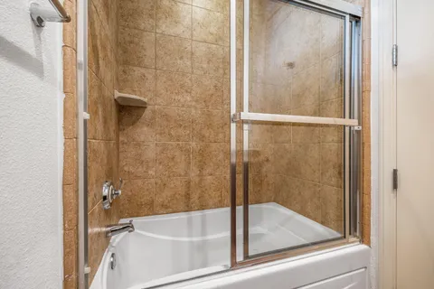 a view of a park with large trees