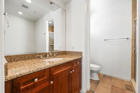 a view of a house with swimming pool and sitting area