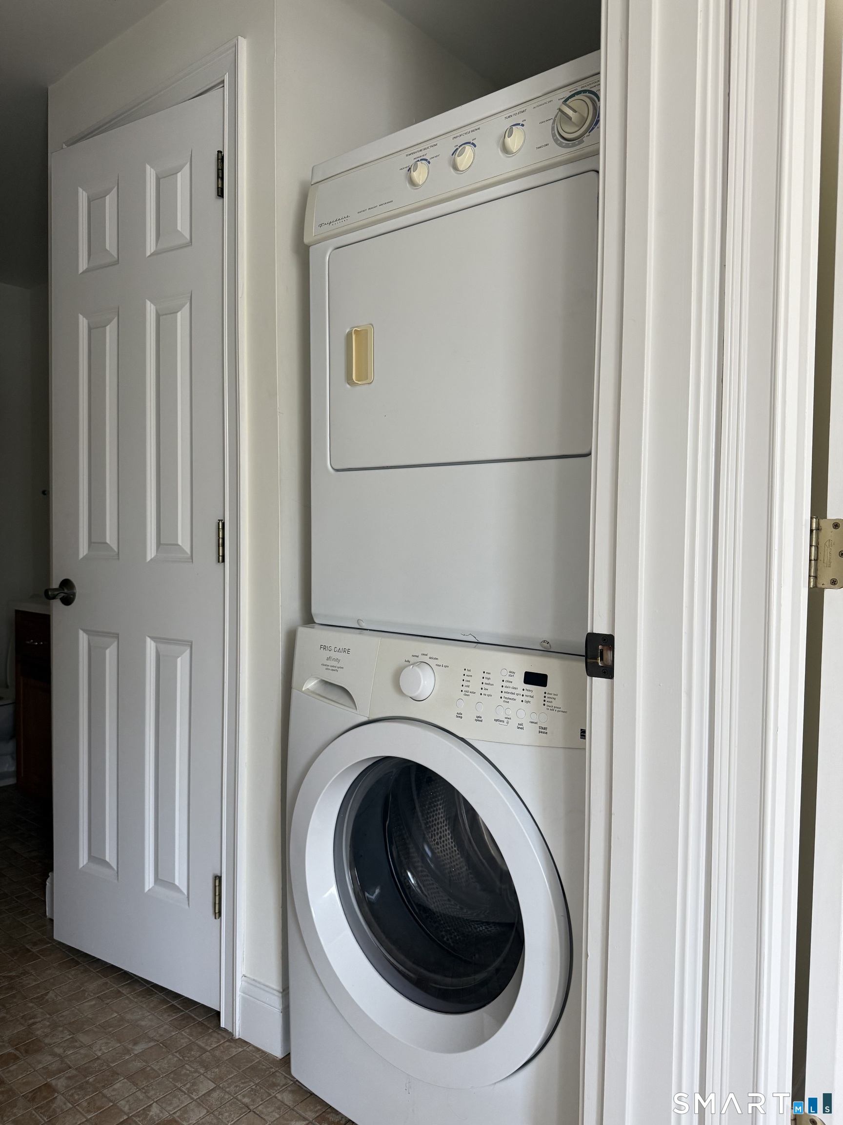 380 Main Street, Unit 16 Wallingford, CT 06492 - Photo 5 of 12 a utility room with dryer and washer