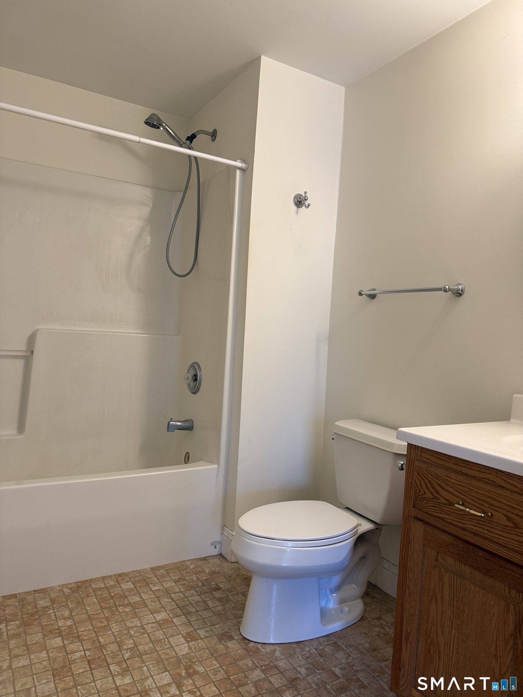 380 Main Street, Unit 16 Wallingford, CT 06492 - Photo 6 of 12 a bathroom with a toilet and a shower