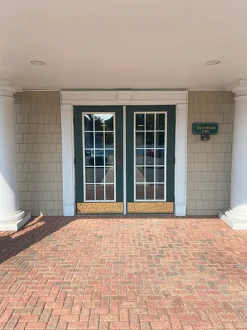 a view of a house with a large window