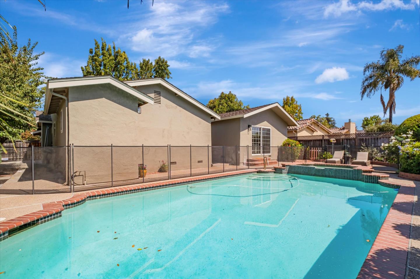 4856 Windermere Drive Newark, CA 94560 - Photo 5 of 6 a view of a house with a yard