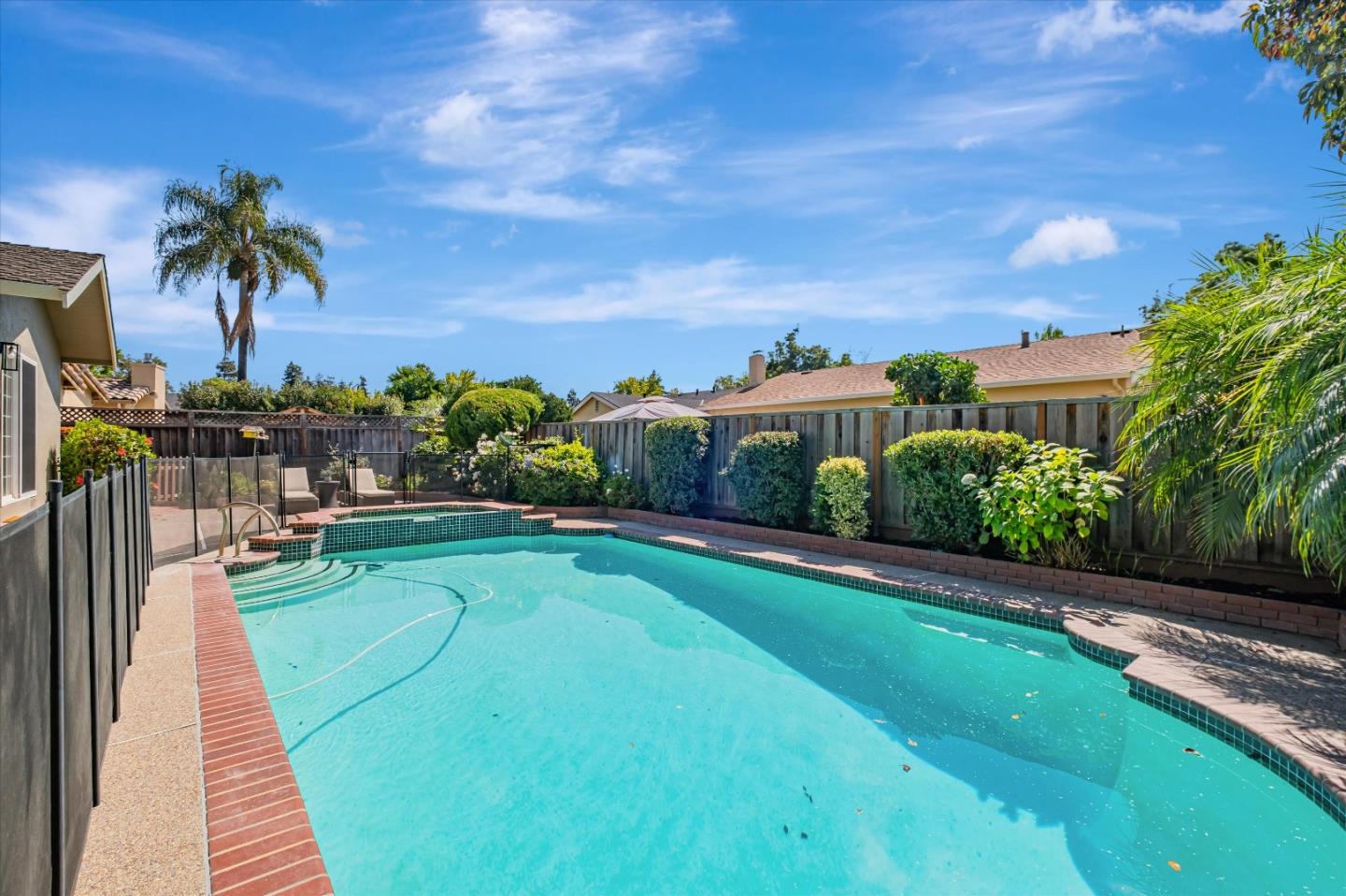 4856 Windermere Drive Newark, CA 94560 - Photo 6 of 6 a view of swimming pool with outdoor seating and plants