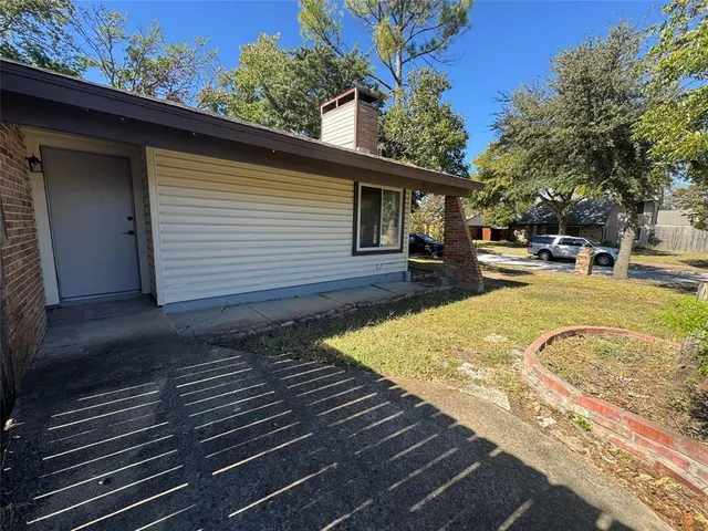 a view of a backyard with a garden