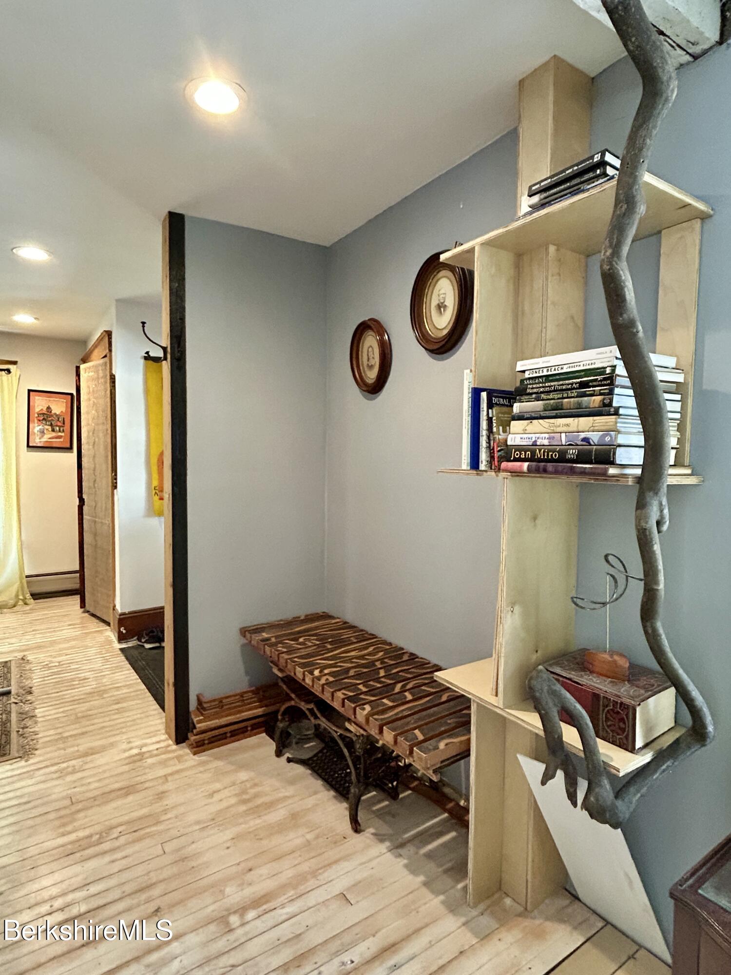 96 East Quincy Street North Adams, MA 01247 - Photo 11 of 16 a room with a stove and a wooden floor