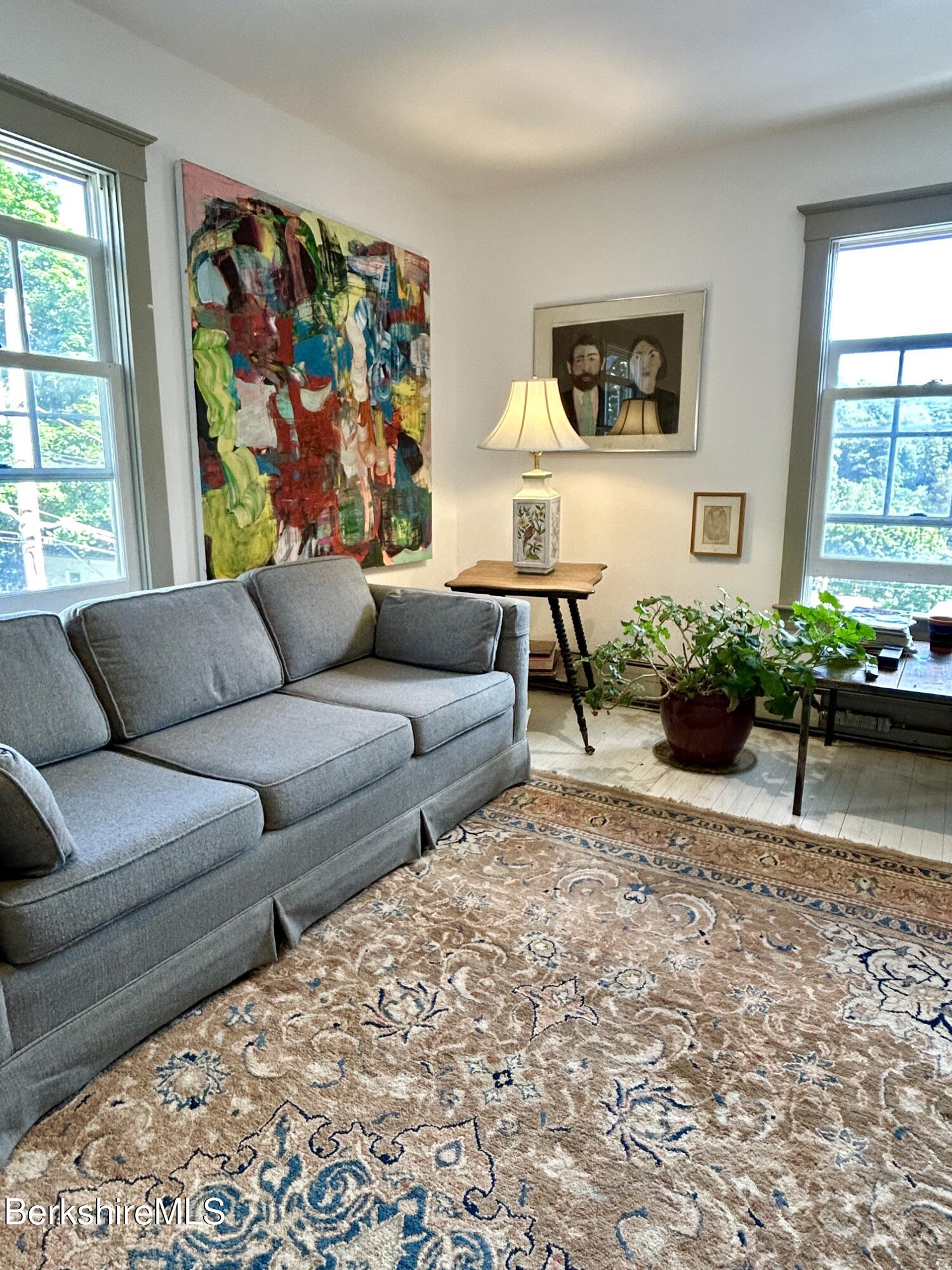 96 East Quincy Street North Adams, MA 01247 - Photo 15 of 16 a living room with furniture and a painting