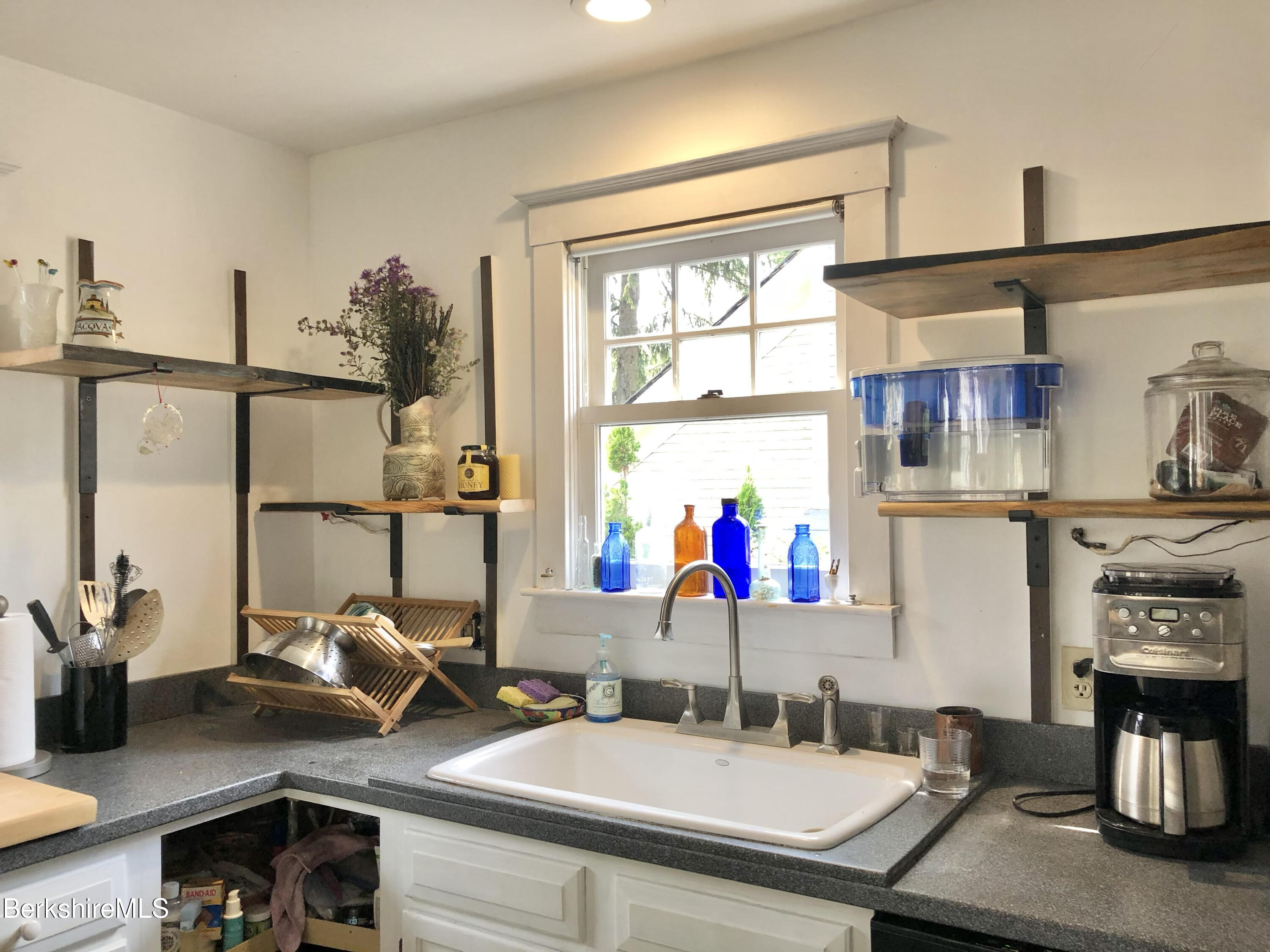 96 East Quincy Street North Adams, MA 01247 - Photo 5 of 16 a bathroom with a sink and a mirror