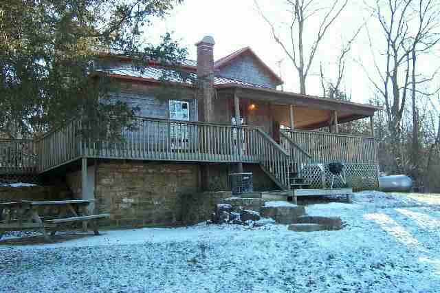 412 East Burke Road Elizabeth, IL 61028 - Photo 2 of 9 a front view of a house with garden
