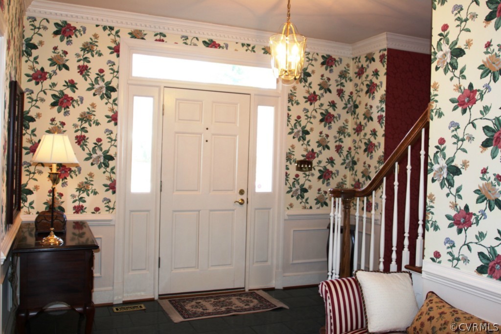 14431 Newgate Road Midlothian, VA 23113 - Photo 4 of 24 view of entryway with window and flower pot