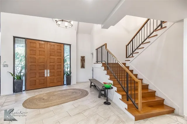 a view of entryway with a front door