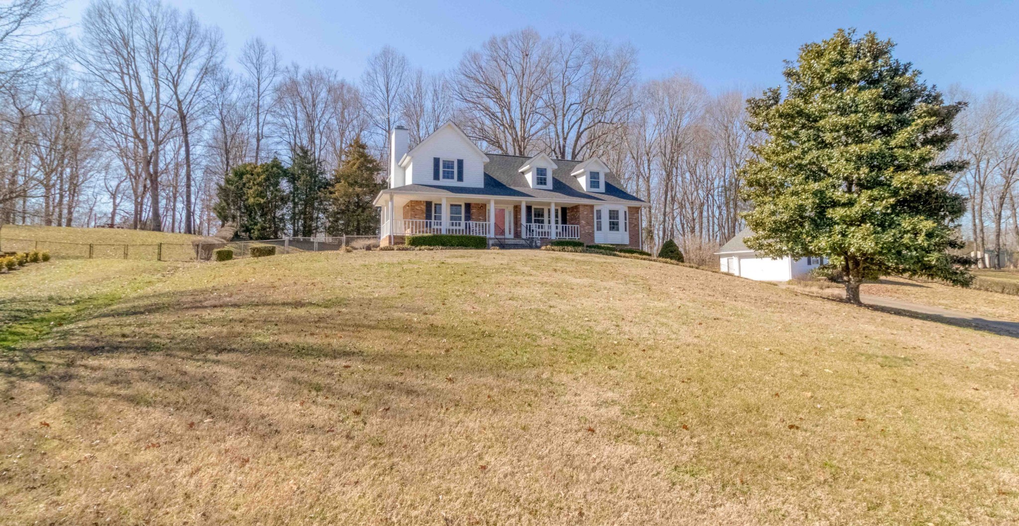 4316 Memory Lane Adams, TN 37010 - Photo 3 of 45 a house with trees in front of it