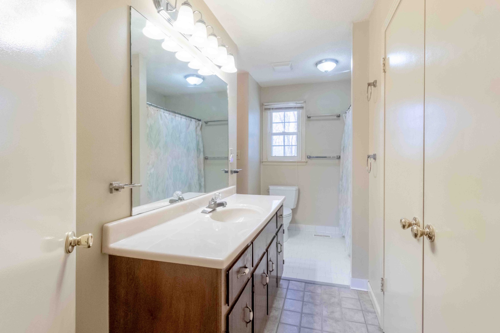 4316 Memory Lane Adams, TN 37010 - Photo 23 of 45 a bathroom with a sink a vanity and a mirror