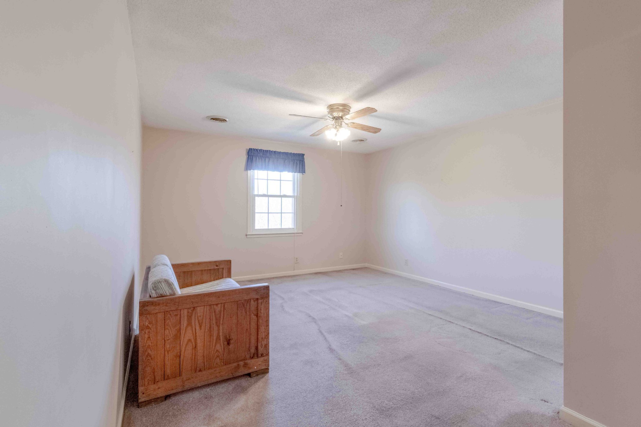 4316 Memory Lane Adams, TN 37010 - Photo 25 of 45 an empty room with windows and fan