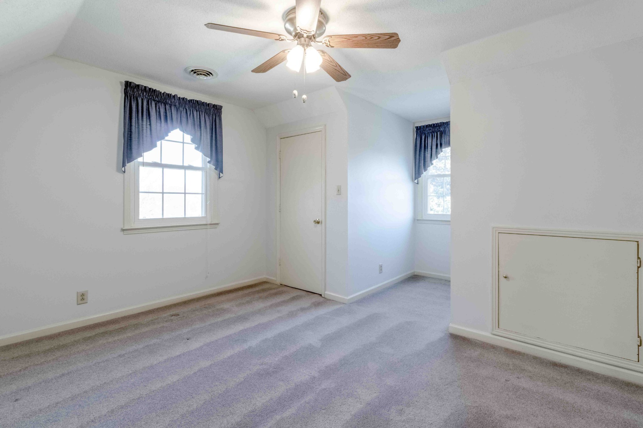 4316 Memory Lane Adams, TN 37010 - Photo 30 of 45 an empty room with windows and fan