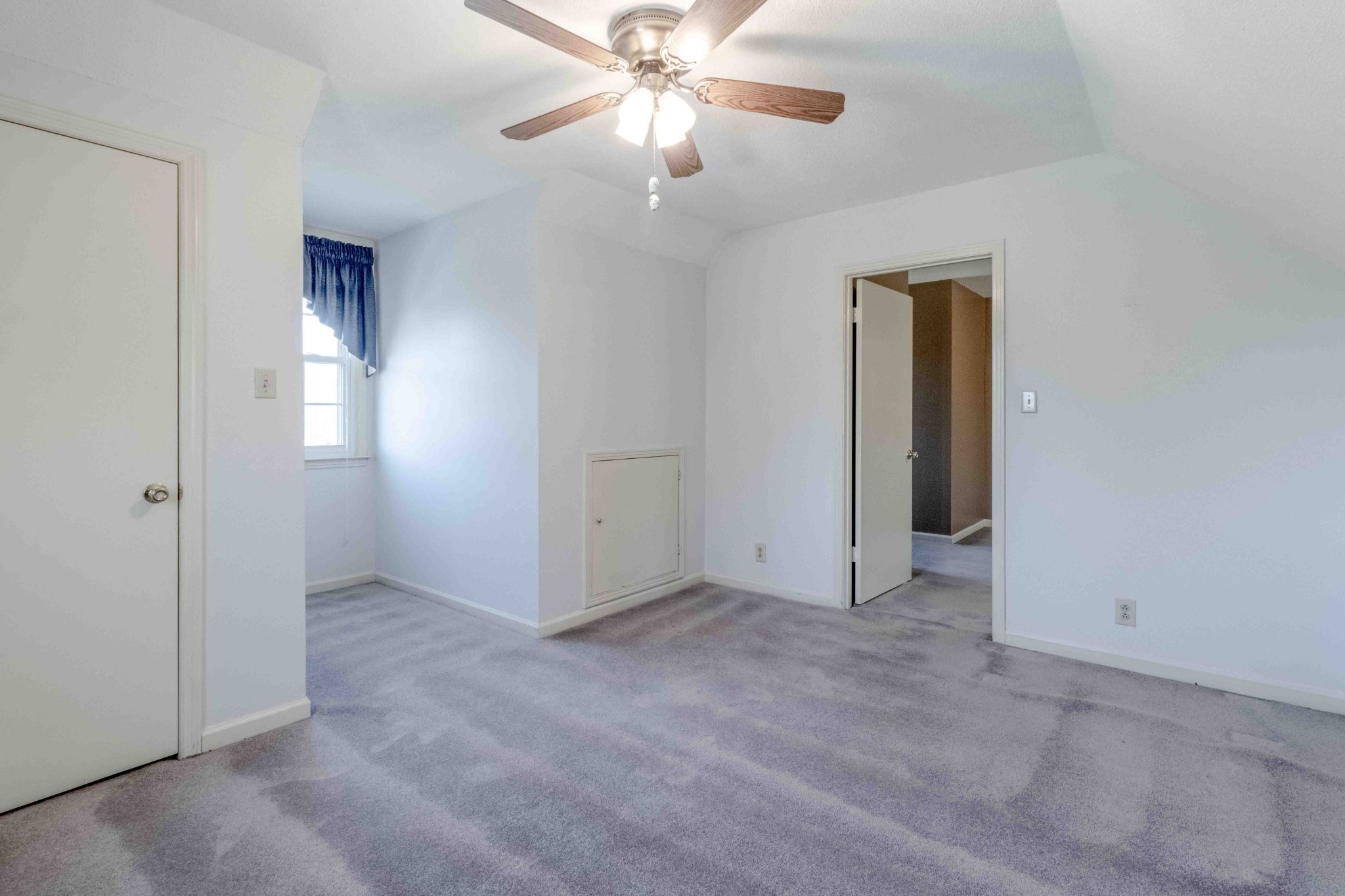 4316 Memory Lane Adams, TN 37010 - Photo 31 of 45 an empty room with closet and a chandelier fan